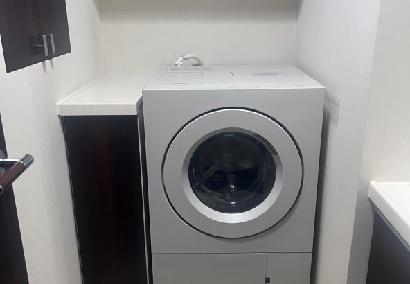 洗濯機収める